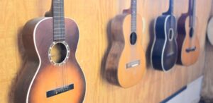 Vintage acoustic guitars on wall