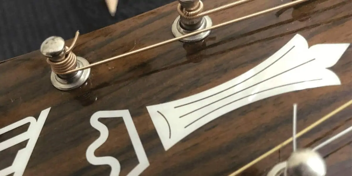 How to restring an acoustic guitar